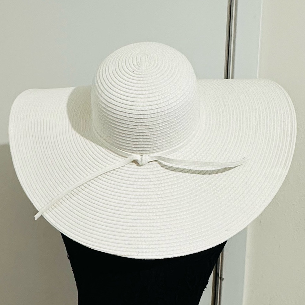 Straw Studios oversized wide brim off white straw hat.